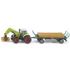 Traktor med balle griber 1:50